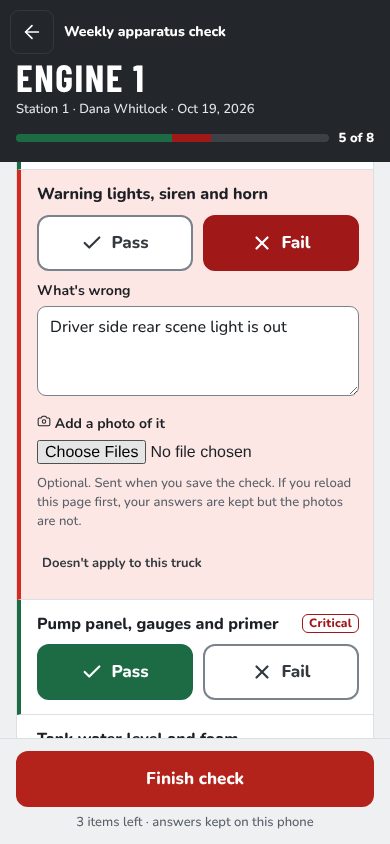A weekly apparatus check for Engine 1 on a phone, item 5 of 8. Warning lights, siren and horn is marked Fail, with the note ‘Driver side rear scene light is out’ and a place to add a photo. The next item, pump panel, gauges and primer, is marked Pass.